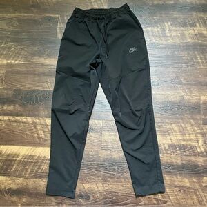 Nike tech woven black CU4483-010 tapered athletic jogger pants small pockets